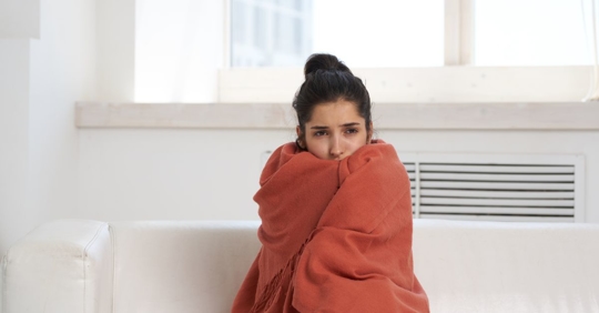 cold woman in home